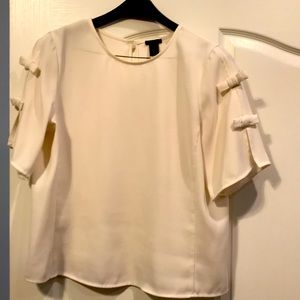 Cream colored blouse